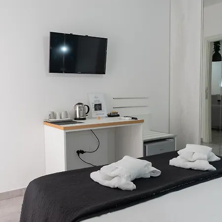 Couette-café B&B Four Winds 50Mt Spiaggia & Castello Aragonese Wifi & Ac 4*